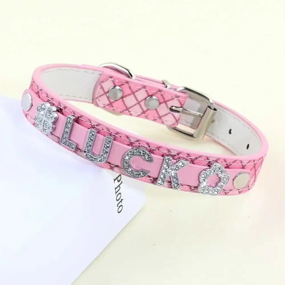 Pink quilted leather bling rhinestone puppy dog collar with silver luck lettering and matching paw print charms