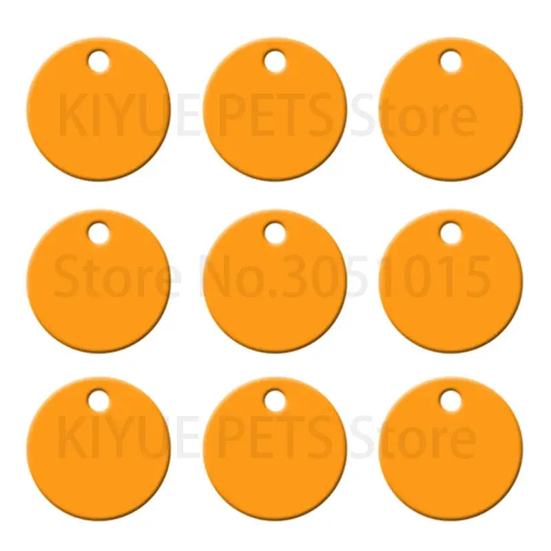Nine bright orange round aluminum custom engraved pet id tags with attachment holes for secure use