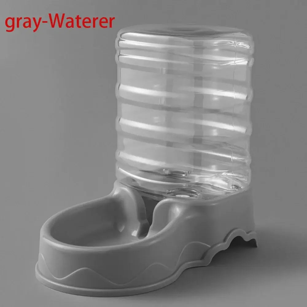Clear plastic water bottle mounted on gray wave-edged base for 3.8L automatic cat and dog feeder fountain
