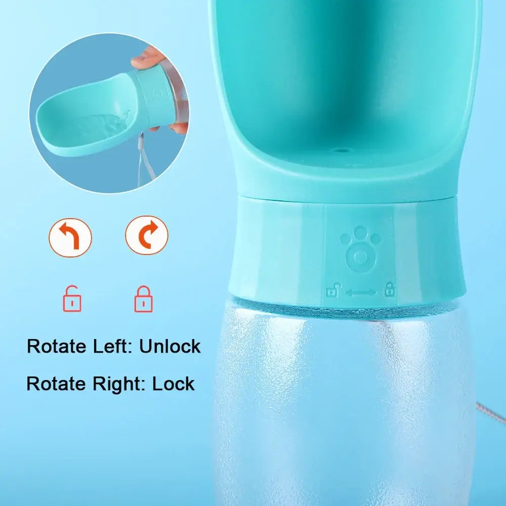 Light blue silicone 300ml portable pet water bottle with clear plastic base and paw print design on the cap