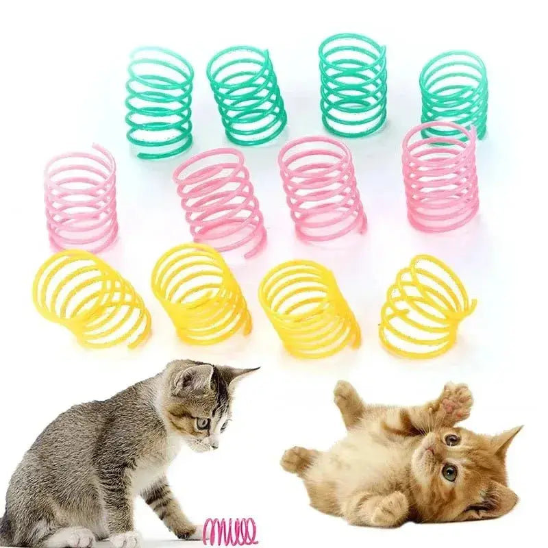 Set of colorful plastic cat spring toys in green pink and yellow coil shapes for interactive pet play