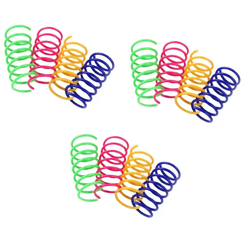 Brightly colored plastic cat spring toys in green pink yellow and blue durable interactive kitten coil springs