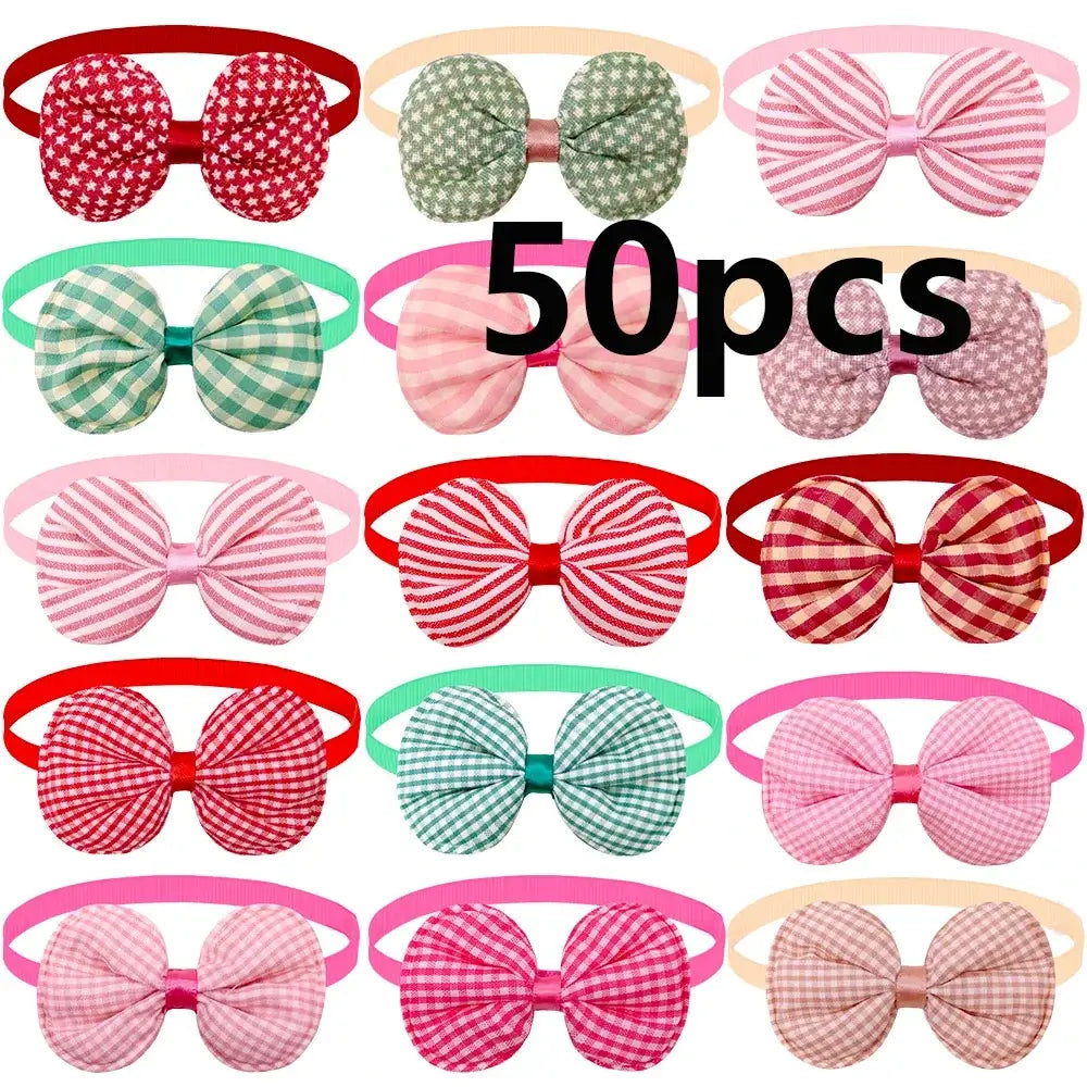 A collection of 50 colorful fabric bow headbands in solid striped and gingham patterns for small dog and cat grooming accessories