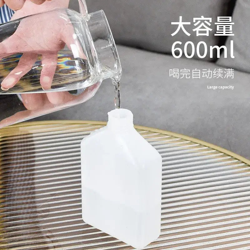 White plastic refillable automatic gravity pet water dispenser with rectangular body and rounded edges for large capacity use