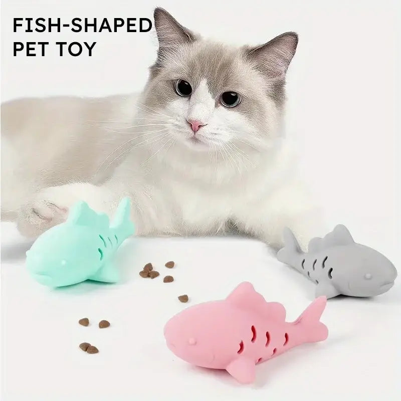 Pastel-colored bite resistant interactive fish-shaped pet toys with textured surfaces and cut-out details for treats