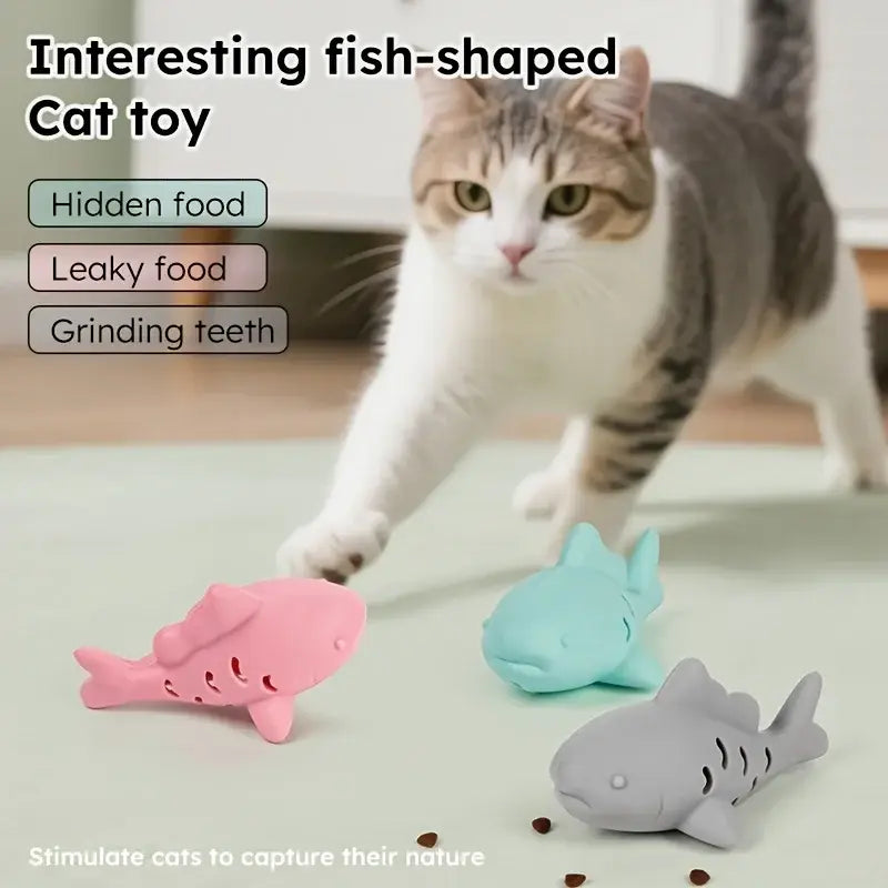 Bite resistant interactive treat dispensing pet toys in pink light blue and gray silicone fish shapes with perforated designs