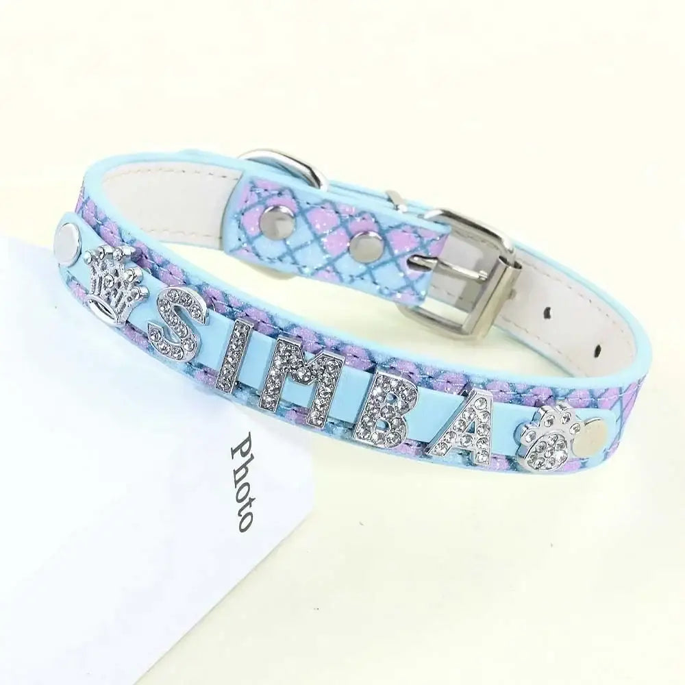 Light blue and purple patterned bling rhinestone dog collar with silver simba lettering and charm for small dogs and cats