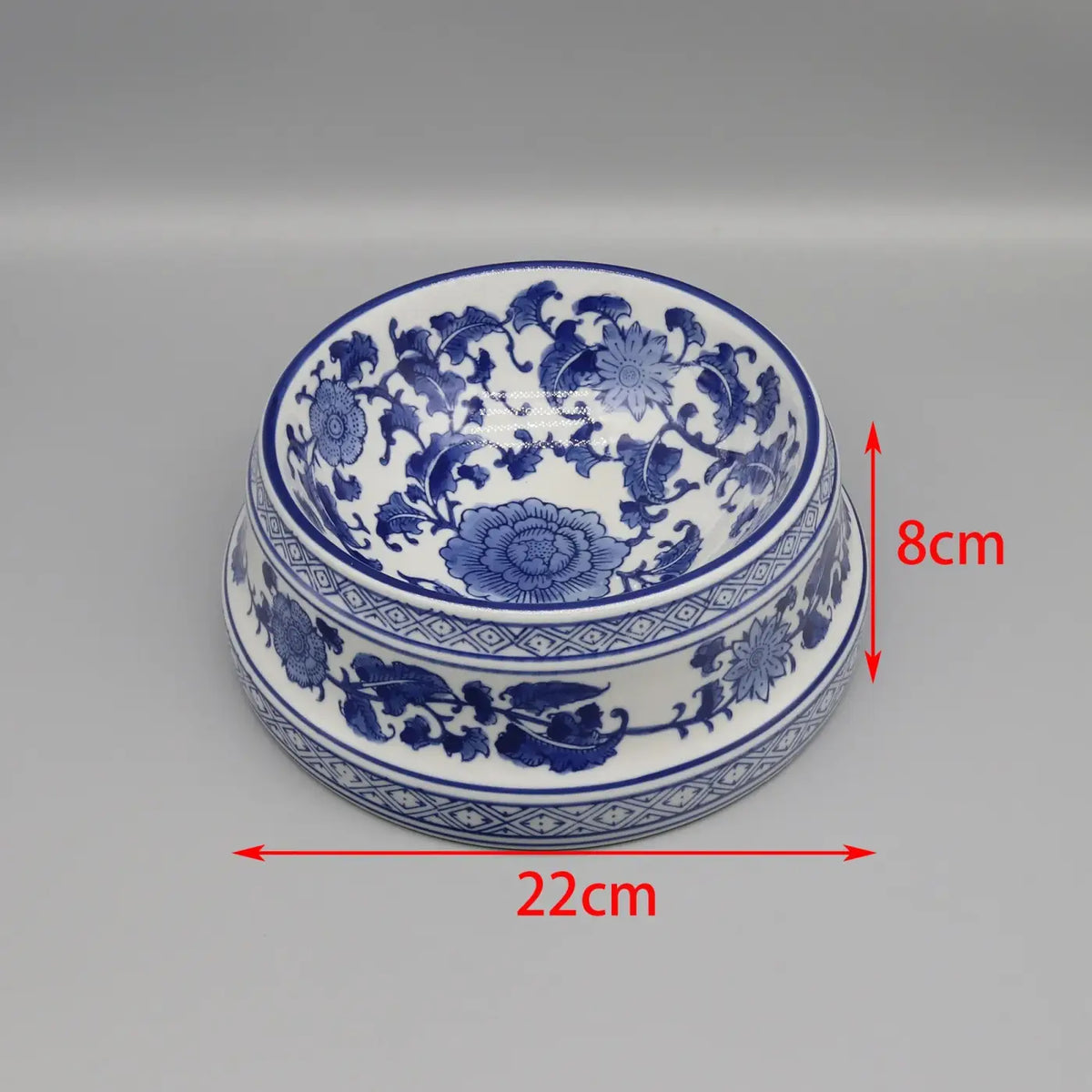 A classic blue and white porcelain ceramic pet feeding bowl with intricate floral patterns 22cm diameter 8cm height