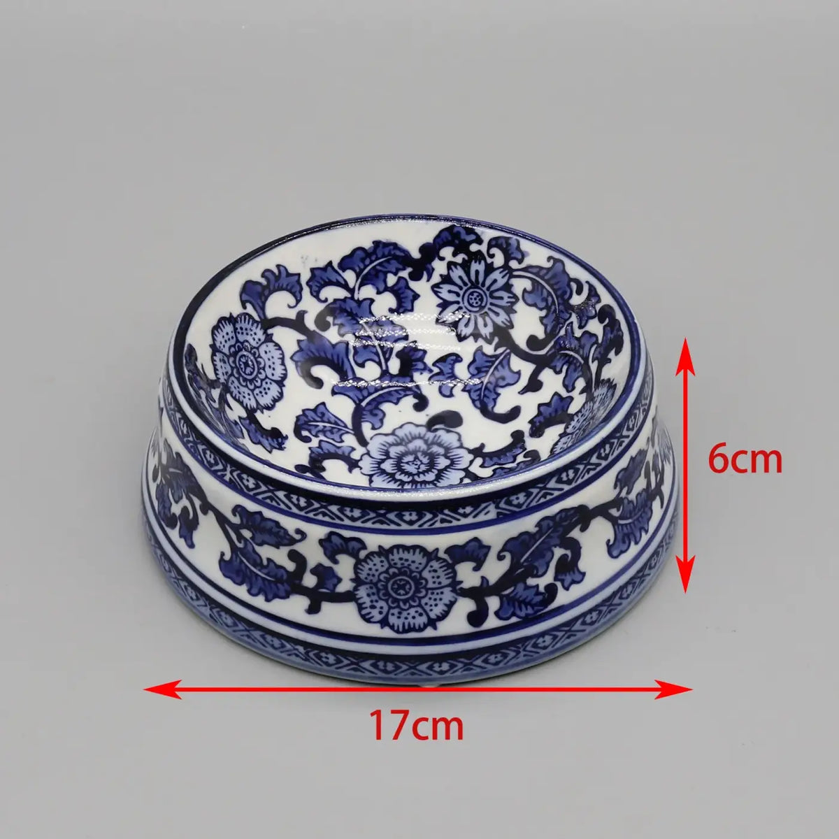 Ceramic pet feeding bowl in blue and white porcelain with intricate floral patterns for pets
