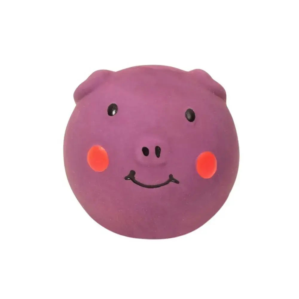 Colorful latex squeaky pig dog toy in purple with orange cheeks and black facial features