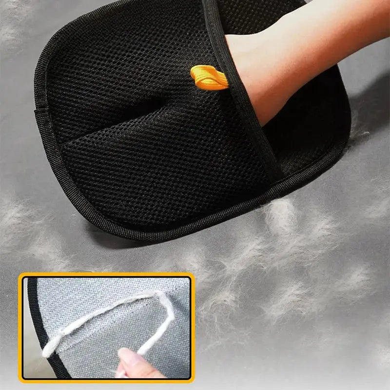 Black mesh double-sided pet hair removal and grooming glove with yellow button on the side for effective fur removal