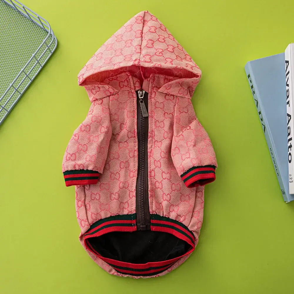 Pink gucci-patterned luxury dog hoodie with red and black striped cuffs and hem for schnauzer pets