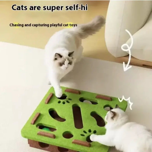 Green and brown interactive felt cat puzzle box mat with paw print cutouts and bell ball for playful cats