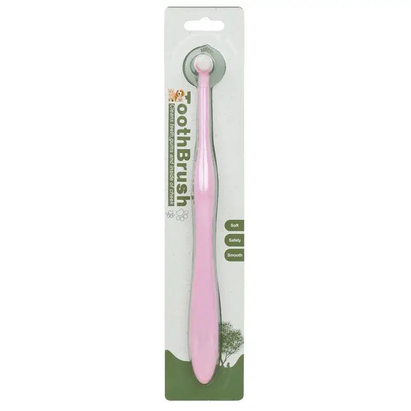 Mini dog toothbrush with a pink plastic ergonomic handle and a rounded soft-bristled head for oral care