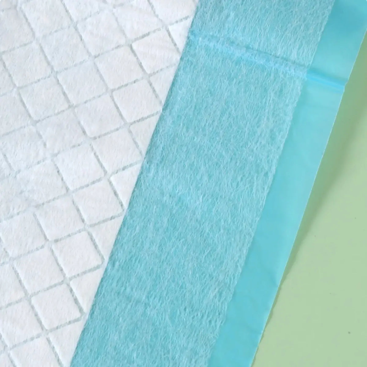 Parrot pee pads super absorbent light blue textured absorbent bird cage liner with quilted white surface and border