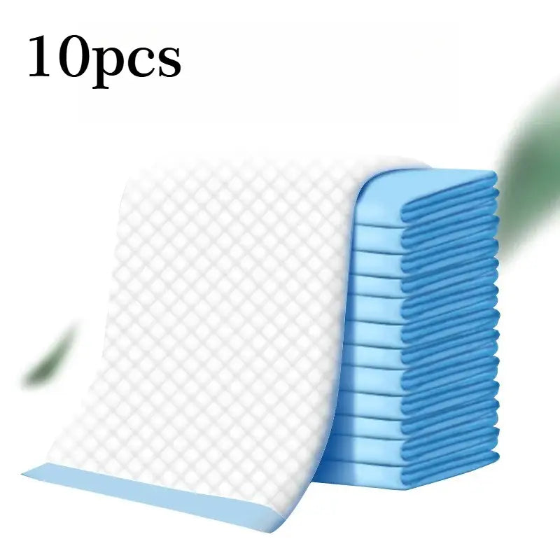 A stack of ten light blue and white parrot pee pads with diamond-patterned absorbent surface for bird cages
