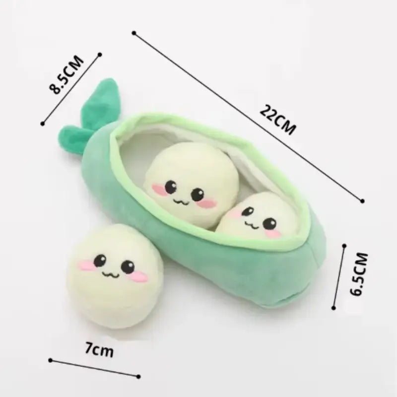 Soft mint green plush pea pod dog toy with three cream character balls and one extra ball for interactive play and stress relief