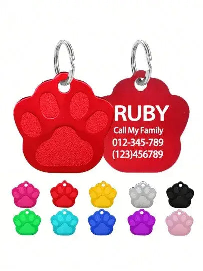 Red paw-shaped pet id tag with laser engraved name and contact info personalized for cats and small dogs