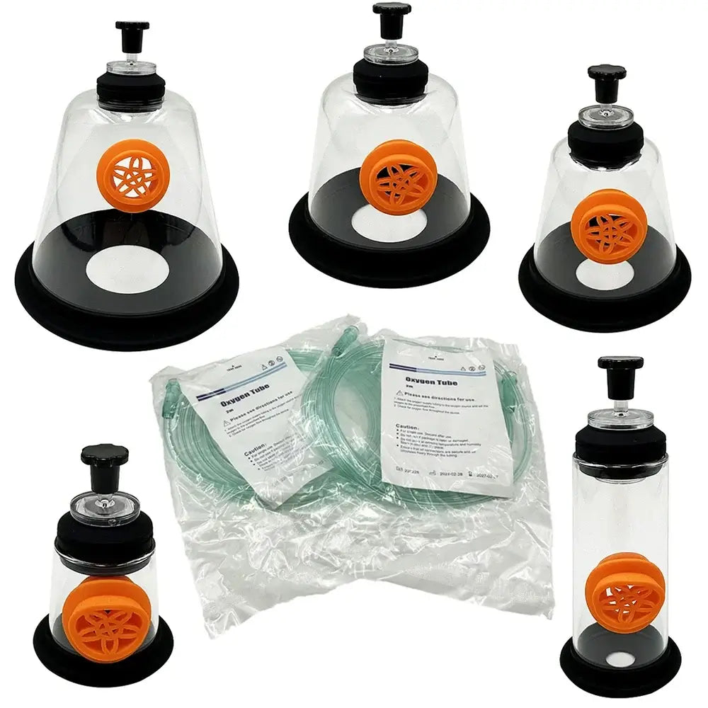 Set of three transparent glass suction cups with black bases and orange valves with packaged oxygen tubing for pet mask kit
