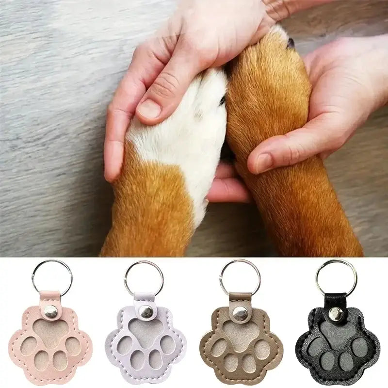 Pet fur memorial keepsake keychain and hair storage bag featuring a soft faux leather paw print in pink lavender tan or black