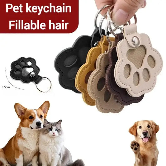 Pet fur memorial keepsake keychains in black tan and beige leather with paw print design and fillable hair storage