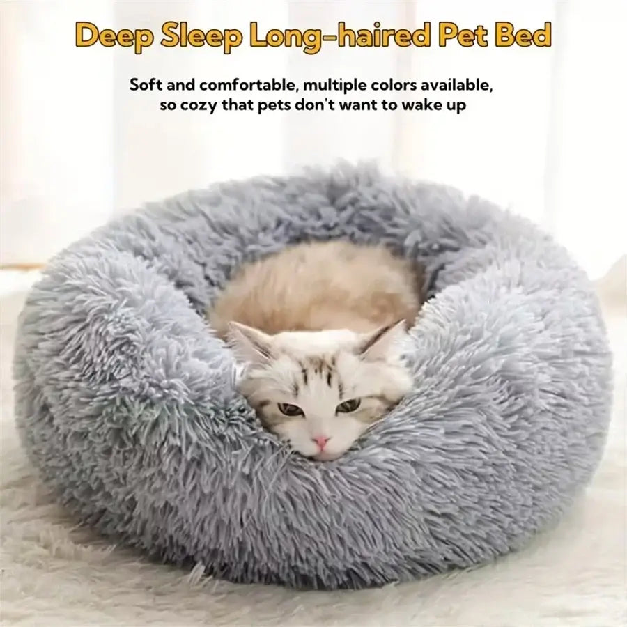 Plush round calming gray pet bed with fluffy long-haired texture for cats and small dogs