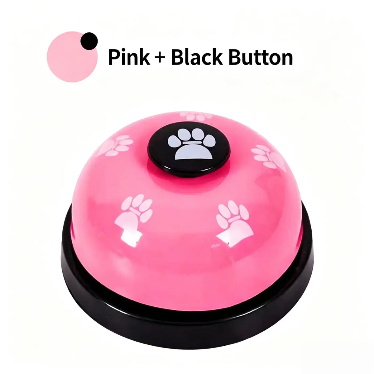 Pink portable pet training and communication bell with black paw-print button and white paw prints on glossy surface