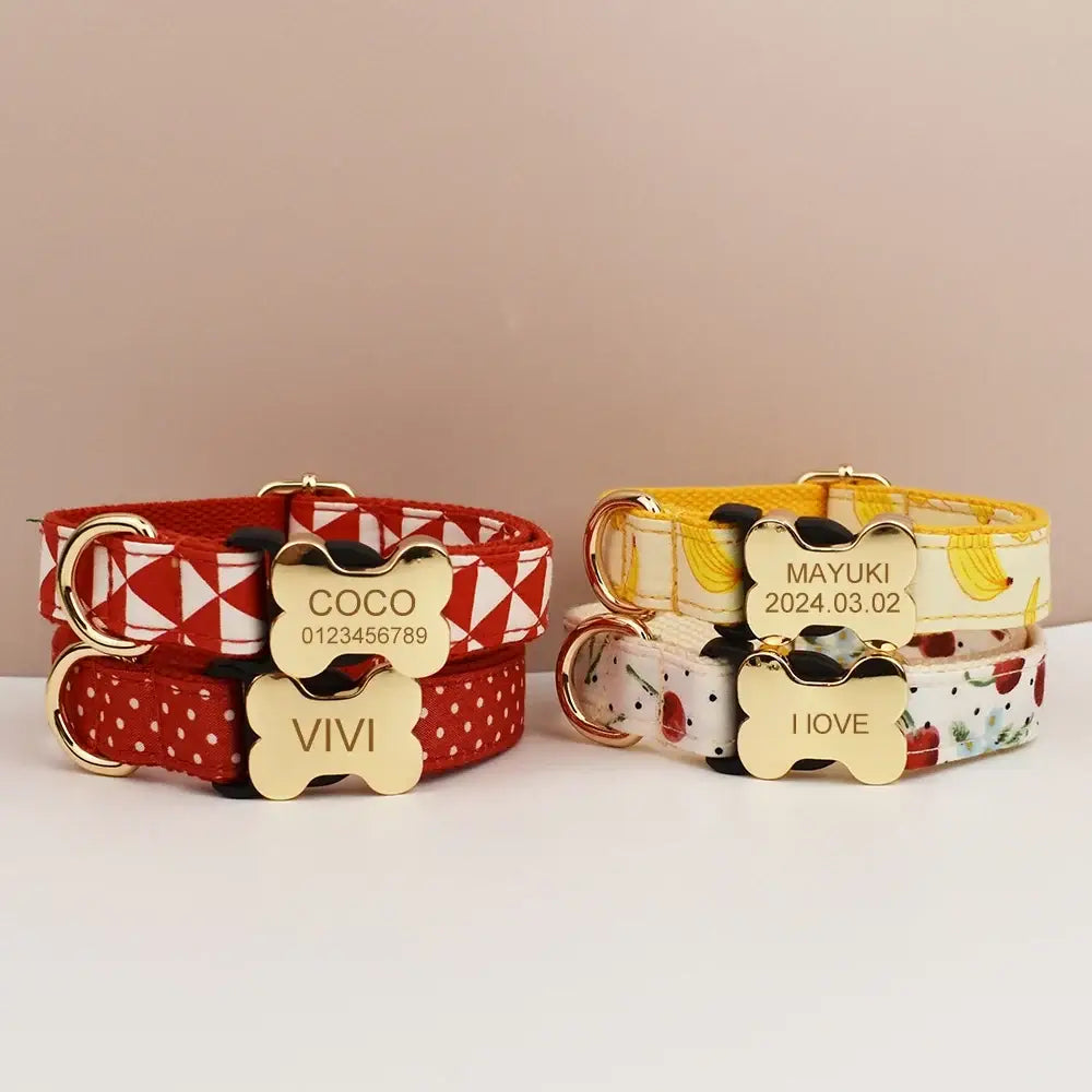 Premium custom engraved dog collars with bone-shaped gold metal tags and red yellow white patterned fabric straps