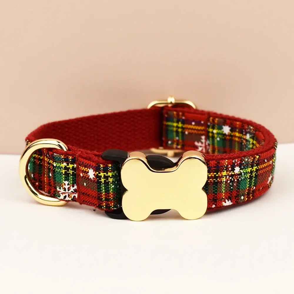Red plaid premium custom engraved dog collar with gold bone-shaped buckle and matching metal ring for comfortable fit