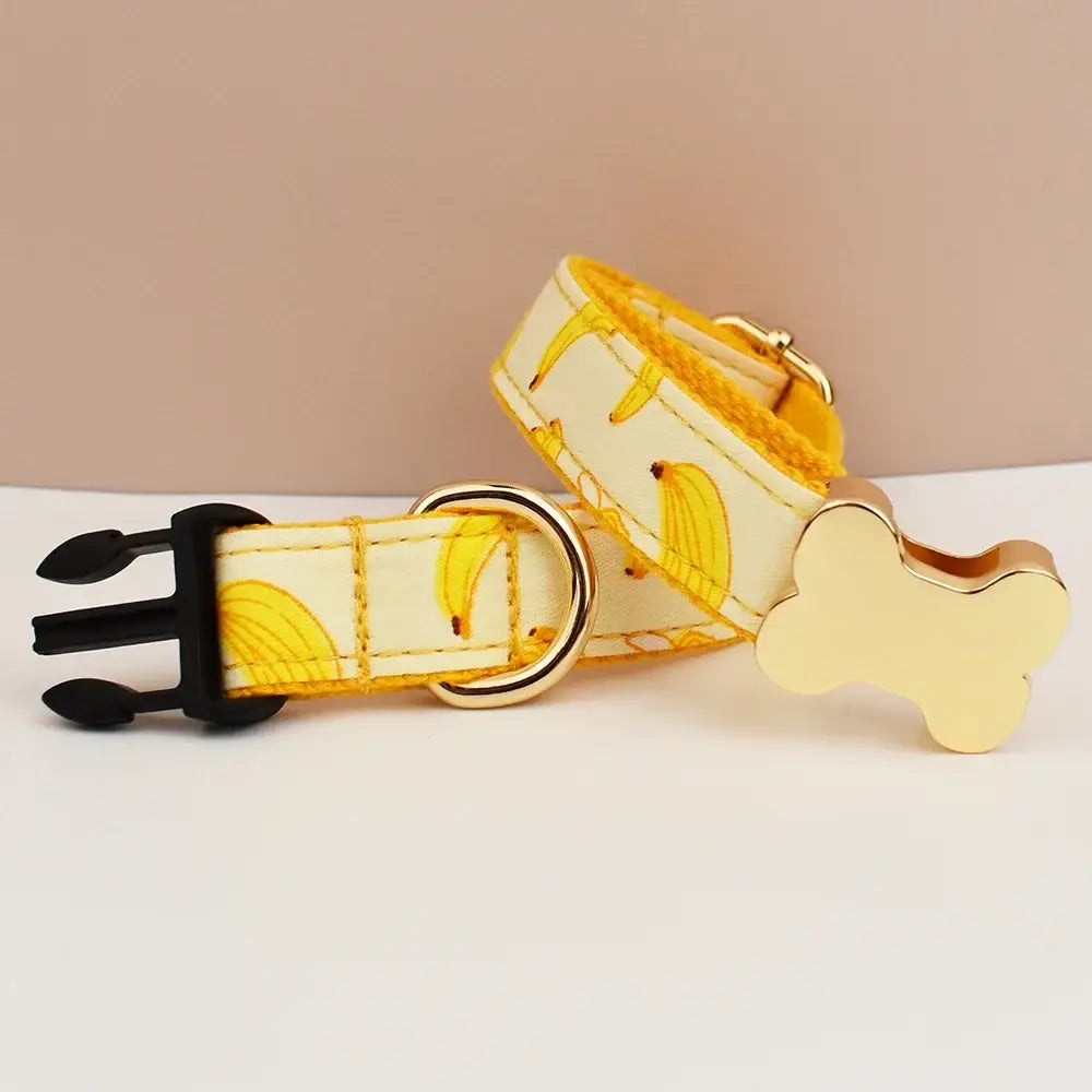 Premium custom engraved yellow banana-patterned dog collar with gold bone tag and black plastic buckle for small to large dogs