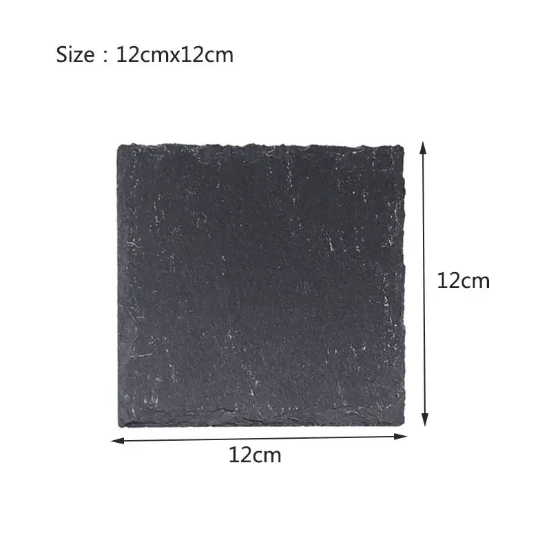 A square black slate tortoise slab mat with a natural rock surface and irregular edges for reptile terrariums